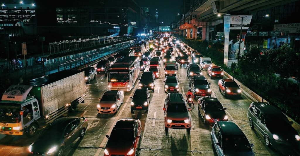 Photo of Vehicles On Road During Evening